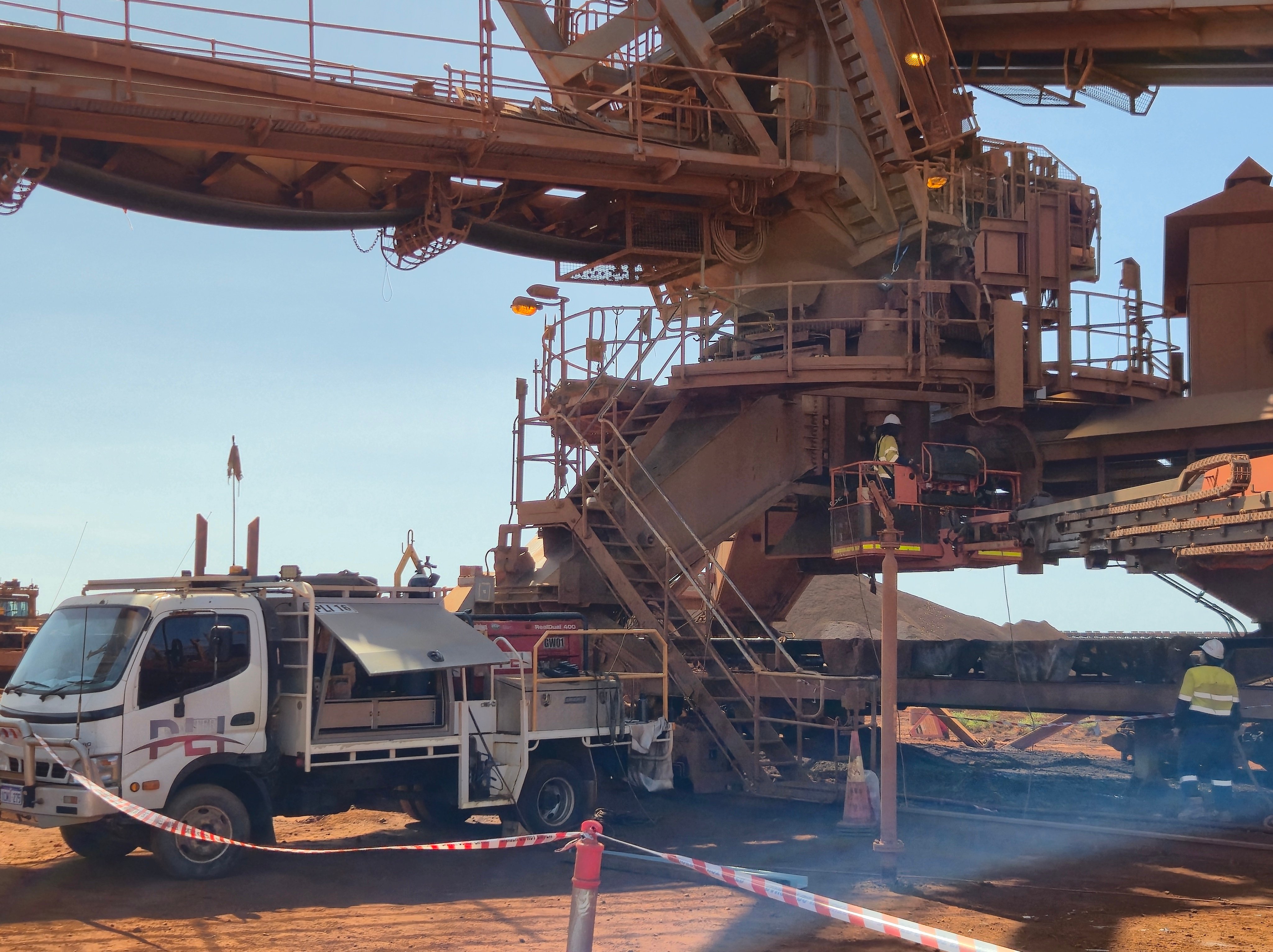PLI crew working on bucket wheel reclaimer maintenance